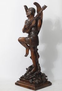 ‘Mephistopheles’ Imposing walnut sculpture, 19th century Italian work.