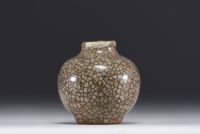 China - Crackled monochrome ceramic ball vase, Ming period.