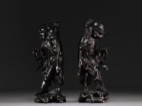 China, Vietnam - Pair of exotic wood carvings representing two figures.