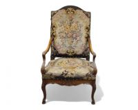 Carved wooden armchair and a seat with floral motifs from the 18th century