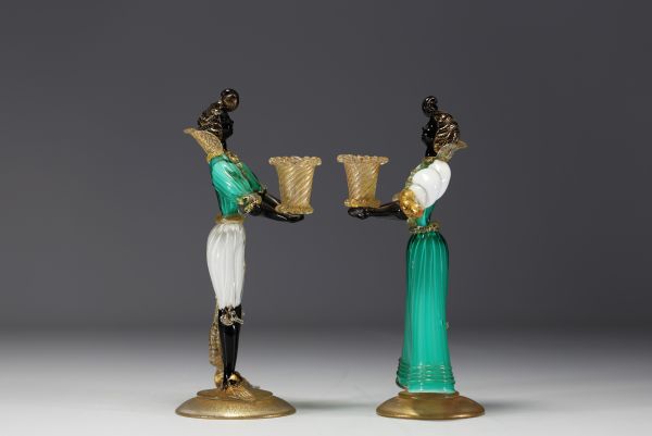 Murano - Pair of blown glass candlesticks with gold flakes.