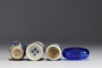 China - Set of four snuffboxes, three in blue-white porcelain and one in Peking glass.