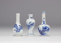 (3) Set of three miniature vases of different shapes in white and blue from the Kangxi period (1661-1722)