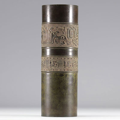 Dark bronze scroll vase with archaic decoration