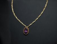 Set in 18k yellow gold and amethyst comprising a pendant, a bracelet, a ring and a pair of earrings, total weight 150g.