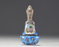 A rare silver and guilloché enamel salt flask decorated with flowers and landscape scenes, 19th century.