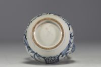 Japan - White and blue porcelain jug with floral decoration, 17th century.