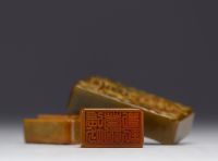 China - Honey-coloured stealite seal in its box.