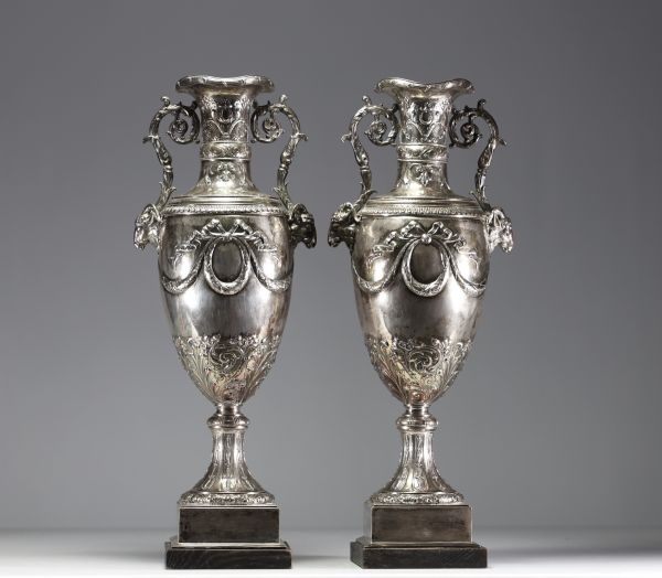 Imposing pair of Louis XVI chased and repoussé silver vases, hallmarks of Paris, 18th century.