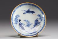 Chine - Ensemble de quatre bols et assiettes en porcelaine polychrome à décor floral et canards.18eme