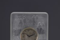 René LALIQUE (1860-1945), small moulded glass clock decorated with swallows, circa 1930.