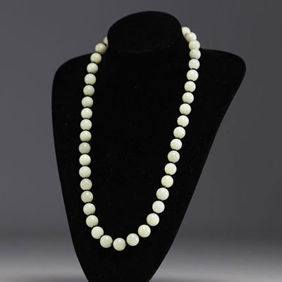 China - Jade pearl and black coral necklace, silver clasp.