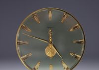 Jaeger-LeCoultre - Glass and brass ‘Squelette’ table clock, 8-day baguette movement, circa 1960.