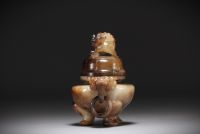 China - Tripod incense burner in brown jade, decorated with Fô dog and dragon head.