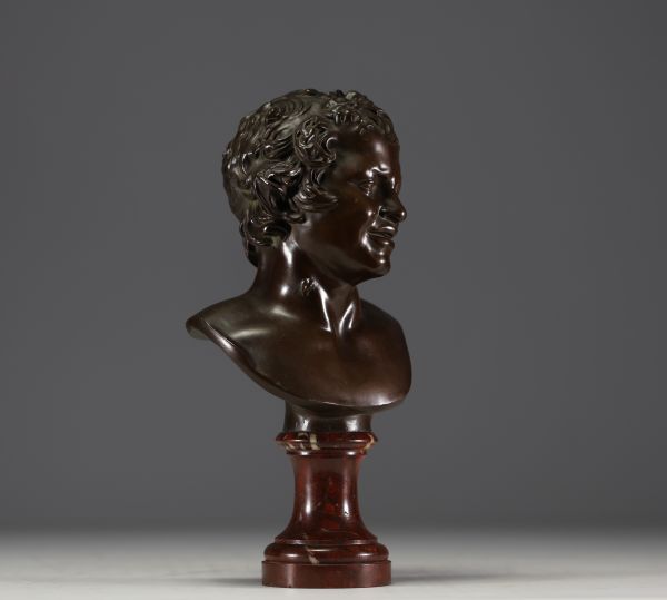 ‘Young Faun’ bronze bust with brown patina on marble base, mark of the Fonderie Nationale des Bronzes ’J. Petermann, Brussels’.