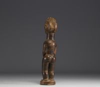 DRC - Iwena female statuette in carved wood.