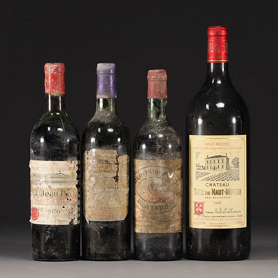 Set of 4 bottles of various Bordeaux wines.