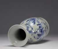 China - A blue-white porcelain vase on a celadon background decorated with figures, 19th century.