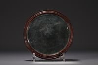 China - Carved jade hand mirror.