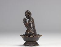 Sculpture of a bronze Buddha resting on a lotus flower from Qing period (清朝)