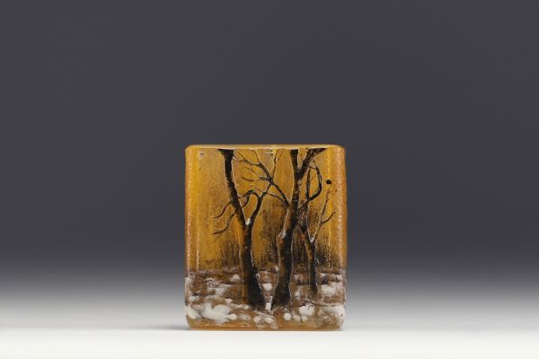 DAUM Nancy - Enamelled and acid-etched glass miniature vase decorated with a snowy landscape, signed under the piece.