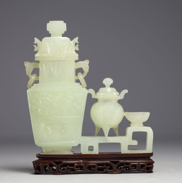 China - Jadeite sculpture representing two covered pots on a wooden base.