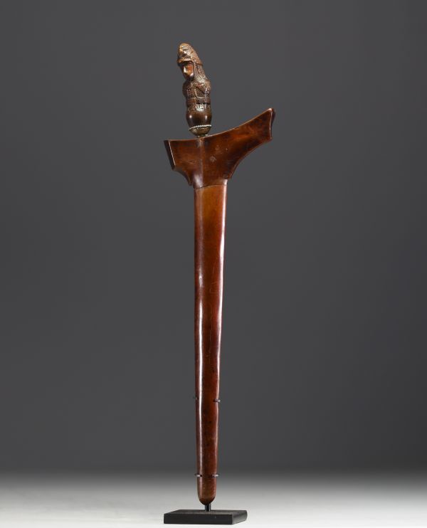 Malaysia/Indonesia - Kriss (Keris) handle in the form of a carved wooden divinity, wooden scabbard, 19th century.