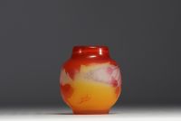 Émile GALLÉ (1846-1904) Acid-etched multi-layered glass vase decorated with berries and leaves.