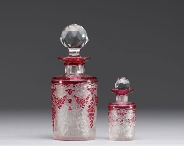 Val Saint Lambert - Set of two bottles in acid-etched multi-layered glass.