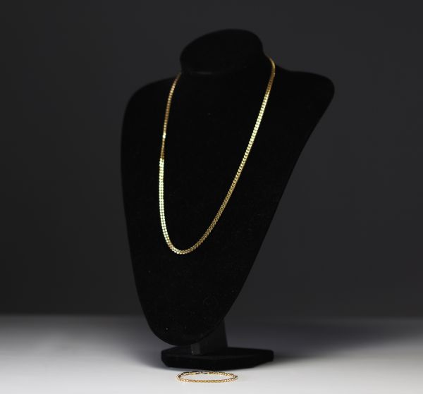 Collier et bracelet en or 18k pour un poids total de 59gr.