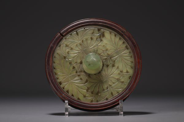 China - Carved jade hand mirror.