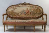 Important ensemble de mobilier de salon en bois sculpté et doré, tapisserie fine d'Aubusson comprenant un canapé et une suite de quatre fauteuils bergères, XIXème.