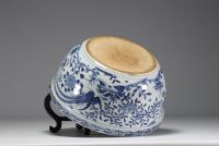China - A white-blue porcelain planter decorated with birds and flowers.