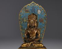 China - A gilt bronze and cloisonné figure of Amitayus from the 18th century.