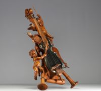 Miroir violon orné de chérubins et d'instruments de musique en bois sculpté, XIXème.