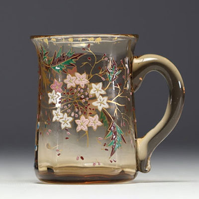 Cristallerie Émile GALLÉ (1846-1904) Small jug with flower decoration in blown and enamelled crystal, signed under the piece.