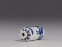 China - white and blue porcelain snuffbox decorated with characters.