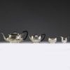 Solid silver tea and coffee service with English hallmarks.