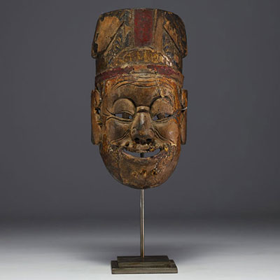 China - Nuo theatrical ritual exorcism mask in polychrome wood, 18th century.