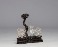 China - Rock crystal Fô dogs on finely carved wooden base, 19th century