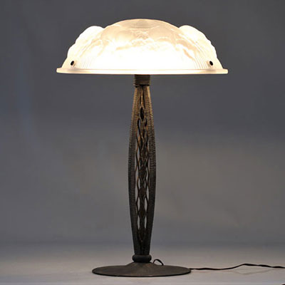 Art Deco desk lamp with hammered bronze base with 3 points of light and stylised glass hood signed 