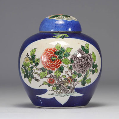 Blue powder-coated vase decorated with flowers