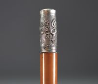 China - Silver cane with dragon decoration, late 19th century.