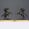 Pair of equestrian sculptures in bronze, figures in the antique style, on a marble base, Charles X period