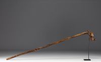 Art Populaire - Carved wooden cane with a hand holding a bird, fully carved shaft.
