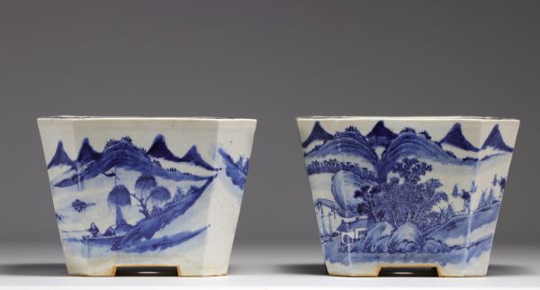 China - Pair of blue-white porcelain planters with landscape decoration, Qing period.