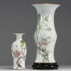 China - Set of two polychrome porcelain vases decorated with birds, circa 1900.