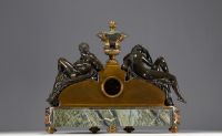 Imposing ormolu and patinated mantel clock decorated with antique figures, marble base, 19th century.