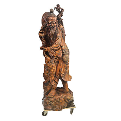 Imposing life-size Asian wooden sculpture 