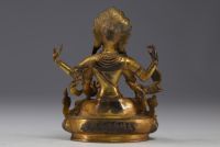 Chine, Tibet - Sculpture en bronze doré avec incrustations de pierres.